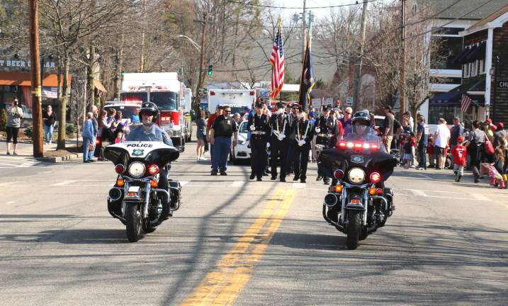 Playball Thel parade was led by a Warwick Police motorcycle escort and a color guard.