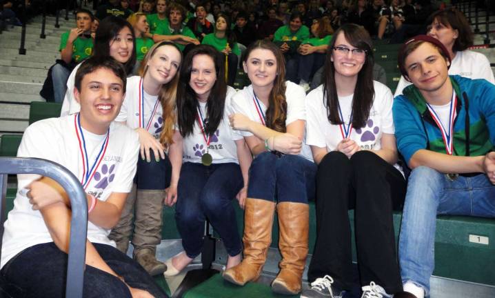 Two Warwick Odyssey of the Mind teams move on to world competition Members of the Warwick Humane Society team (formerly Warwick Valley High School) are, from left to right: Tyler Folino, Agnes Kim, Julia Heeren, Emily Hogan, Ashley DiCarlantonio, Jenna Flatley, Jimmy DePierro and Coach Kelly DiCarlantonio.