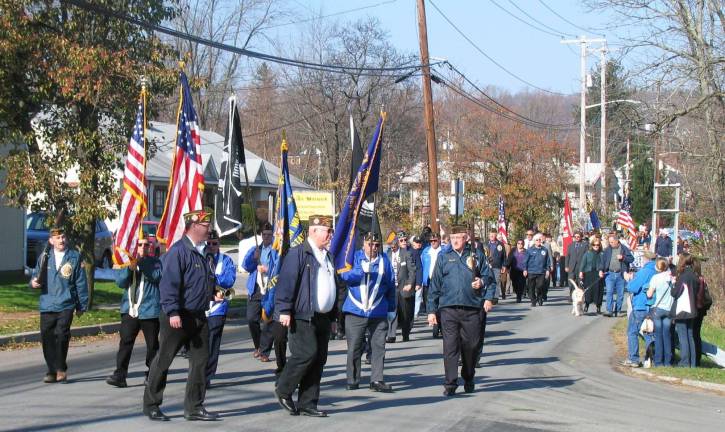 11-11-11 in 10990 Additonal photographs can be found online at warwickadvertiser.com Veterans and other groups marched down Forester Avenue to Veterans' Memorial Park.