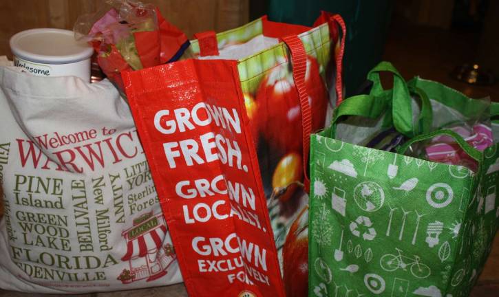 Town to decide on 5 cent bag charge Tuesday The Warwick Town Board has heard from dozens of residents since February on the proposed 5 cent fee on single-use carry out plastic and paper bags. Now, the board will make its decision on Tuesday, May 8.