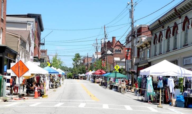 The Main Street parking spots that are often used to position vendors for annual events could be closed to create a pedestrian walkway, allowing the restaurants to set up dining areas on the sidewalk and a safe distance from any vehicular traffic. File photo by Roger Gavan