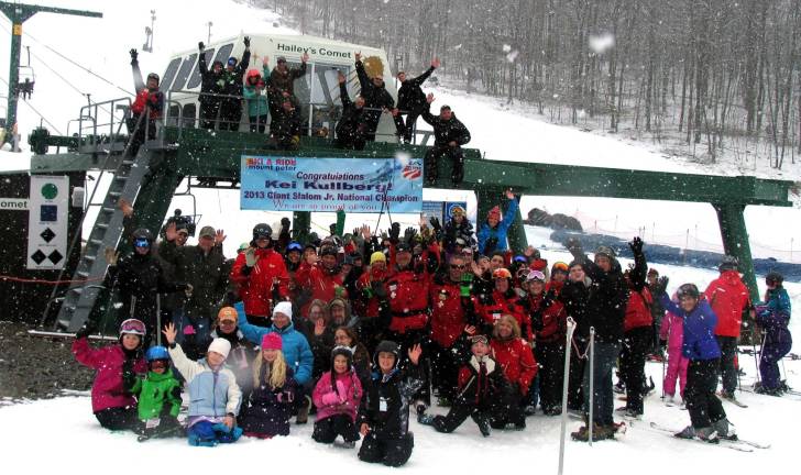 Mt. Peter holds Spring Rally and Wacky Water Skiing Contest Photo by Roger Gavan Everyone associated with Mt. Peter waves hello to one of their own, Kei Kullberg, 2013 Giant Slalom Jr. National Champion. The banner reads: "We are so proud of you."