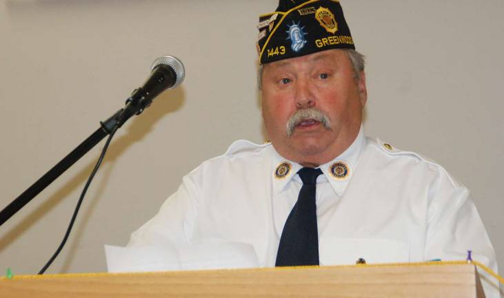 Greenwood Lake remembers and honors GWL American Legion Post 1443 Commander Gerry Brewer speaks during the indoor ceremony.