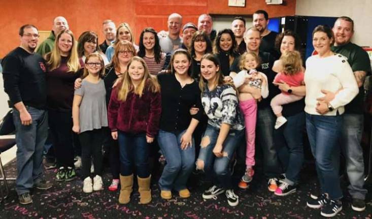 Warwick Volunteer Fire Department raises approximately $4,000 in Bowling with the Braves 150th Anniversary event Bowlers pose for a group photo.