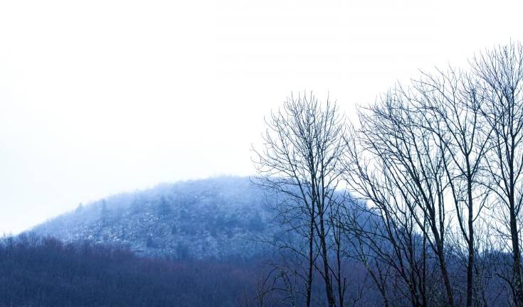 A dusting of snow on the summit of Sugar Loaf Mountain. Photo: Joe Poon