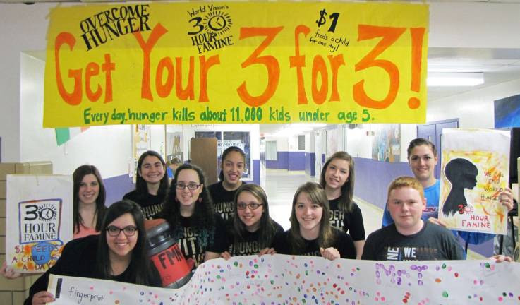 Students raise $600 to fight hunger Warwick Valley High School students brought awareness of world hunger to their school late last week with the ìGet Your 3 for 3î fund raiser. Pictured from left to right are: Sarah Milby, Gianna Rotondo, Kathryn Fernandez, Heather Arcelli, Emma Soto, Emily Mears, Ceili Brown, Kelsey Sellers, Neal Curran and Alyssa Caren.