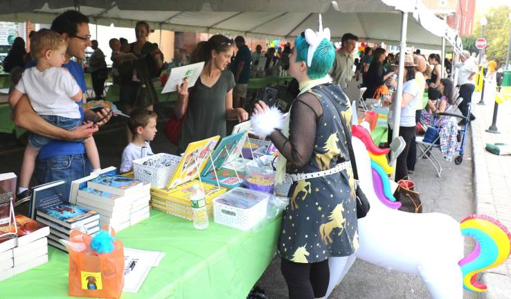 Children's Book Festival raises $7,000 for Albert Wisner Public Library Some of the authors and illustrators, like Ame Dyckman, wore hats and costumes that portrayed the themes and subjects of their writings and illustrations.