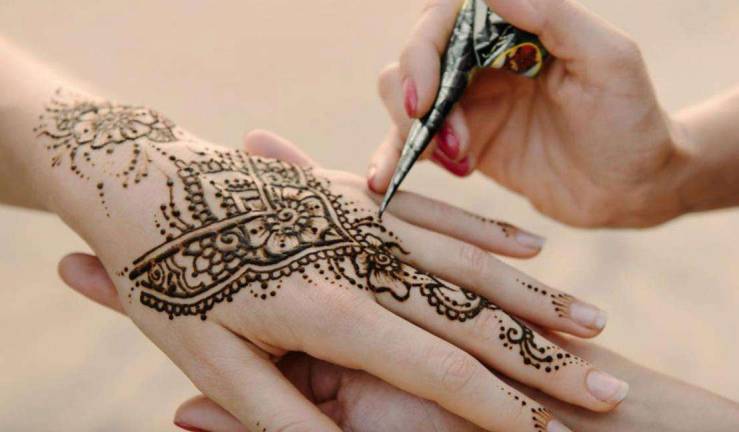 Come early to the program on Bollywood Dancing at the library on Aug. 24 and have your hands painted with henna.