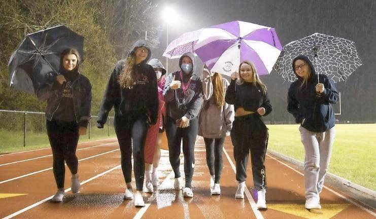 Beginning last Friday night, Warwick Valley High School seniors and a few parents gathered in the heavy rain for the first Light The Lights tribute on Friday evening, May 8. The lights on C.A. Morgan Field will shine bright every Friday night through graduation, beginning at 8:20 p.m. and remain on for 20 minutes and 20 seconds for the 307 members of the Class of 2020. The lights symbolize many things to many people but the focus will be on 307 students who make up the senior class and the bright futures that await them upon graduation.