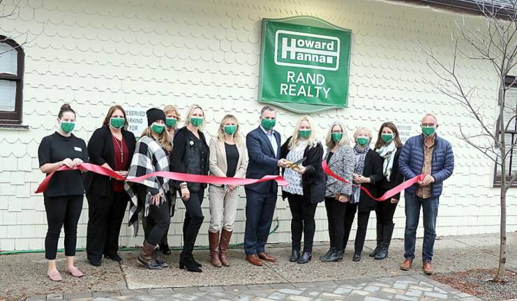 On Thursday, November 12, members of the Warwick Valley Chamber of Commerce joined CEO Matt Rand, Branch Manager Rachael Heiss (center) along with agents and staff at 25 Railroad Avenue to celebrate the Howard Hanna | Rand Realty partnership with ribbon cutting ceremony.