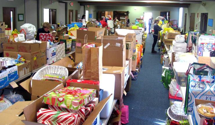 Warwick Ecumenical Council distributes 260 Christmas food baskets Volunteers for the Warwick Ecumenical Council collected and distributed 260 Christmas food baskets at the Warwick United Methodist Church. According to Chairperson Marge Koopman, this community wide effort, which brought volunteers together from the entire Town, resulted in another record number of food baskets delivered to needy families.