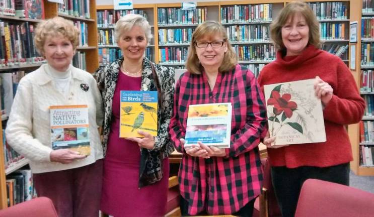 Shown here at the Village of Greenwood Lake Library are Warwick Valley Gardeners President Gert Galligan, Marcela Gross, Greenwood Lake Librarian Joan Carvajal and Cathy Garofalo.