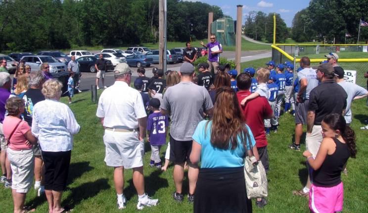 Warwick Little League rededicates field to Ed Cassin On Saturday, June 15, the Warwick Little League rededicated the Minor boys field in Veterans Memorial Park to Edward J. Cassin, who served as the Leagueís Head Groundsman for 20 years and had committed himself to the upkeep and improvement of the League Facilities.
