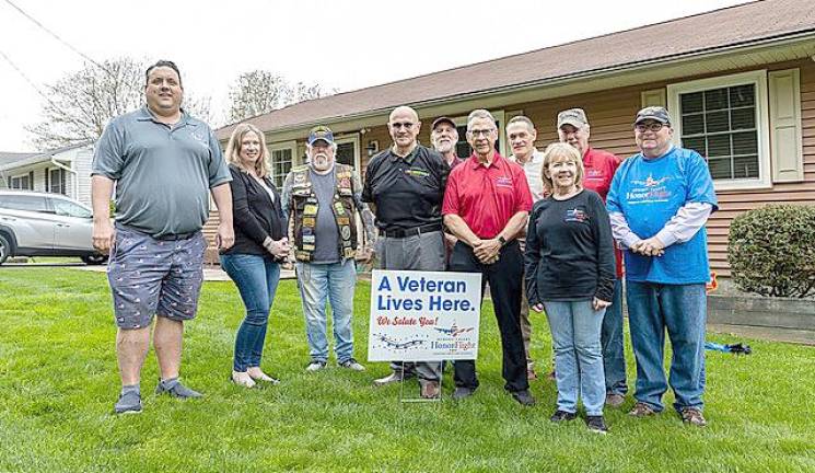 Pictured from left to right are: Frank Kimler, Hudson Valley Honor Flight Chairman; Jennifer DeFrancesco, Hudson Valley Honor Flight Executive Director; Skip O’Donnell, President, Orange County Veterans Coalition; William Taylor, USN Vietnam veteran, Larry Newmann, Supervisor Vet2Vet Program; Tom Walraven; Christian Farrell, Director of Orange County Veterans Services; Carol Smith, Hudson Valley Honor Flight Vice Chair; Bill Sestrom; and Bill Skennion.