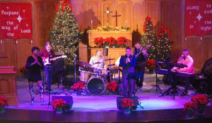 Rev. Michael Otte receives Backpack Snack Attack 'Champion' award The Backpack Snack Attack Community Benefit Concert was held Dec. 3 at the Warwick Reformed Church and featured the Latin Grammy nominated 3d Rhythm of Life with guest vocalist Chris Alfinez and gospel singer Tiffany T’zelle.