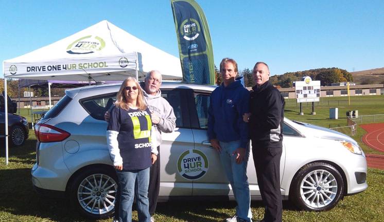 Program raises nearly $6,000 The Drive4UR School support team are, from left to right: Leo Kaytes Ford Sales Manager Leslie Culkin; Warwick School Advocate Jim Sciarra; Leo Kaytes Jr.; and Warwick Valley Athletic Director Gregory Sirico.