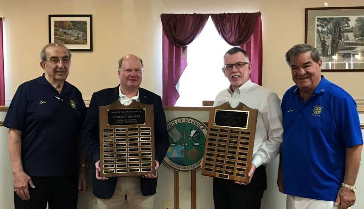 Rotarians seek nominations for Warwick Citizen of the Year Photo by Rosemarie Bastanza Warwick Rotarians are seeking nominations for Warwick’s 2018-19 Citizen of the Year. Committee members include, left to right Co-chair Leo Kaytes Sr.; Rotary President Ed Wiley, holding the Rotary plaque listing recent winners; Master of Ceremonies Michael Sweeton with the Jaycee plaque honoring winners from 1968-1999; and Co-chair Stan Martin. The Warwick Citizens of the Year plaques are displayed at Town Hall.