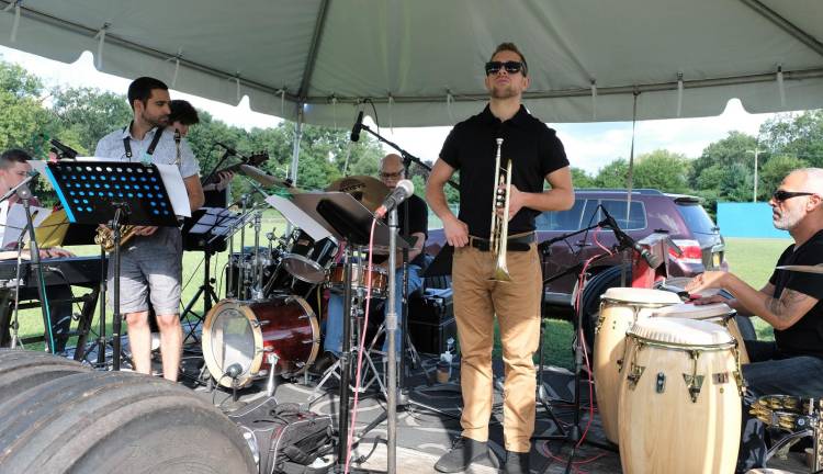 Thanks, and then some, for all that jazz Composer/drummer/producer/clinician Roland Vazquez and his group at Pine Island Park on Kay Road in Pine Island, one of the 14 locations for the 22 performances of the four-day Hudson Valley Jazz Festival.