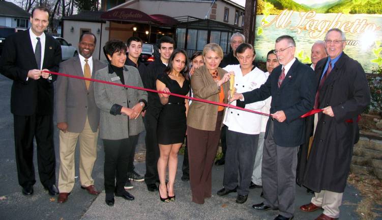 Italian restaurant reopens grandly Photo by Roger Gavan On Nov. 15, Town of Warwick Supervisor Michael Sweeton, Greenwood Lake Mayor Barbara Moore and members of the Warwick Valley Chamber of Commerce joined owner/chef Tony Kolaj, his partner Jessica Stillman, friends and staff members for the grand reopening of their restaurant, Al Laghetto.