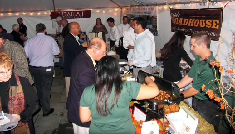 Neither rain nor wind nor threat of tornadoes Photo by Roger Gavan According to Michael Johndrow, executive director of the Warwick Valley Chamber of Commerce, many reported that the 19th annual Taste of Warwick offered the best sampling of gourmet dishes and wine to date.