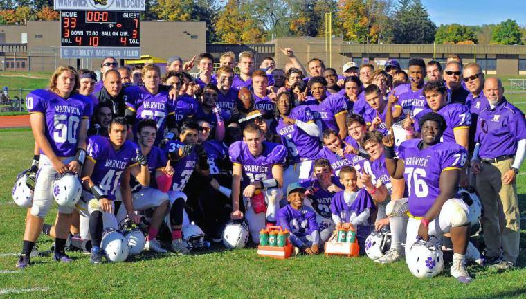 Photo provided by Gregory Sirico The Warwick Valley Varsity Football team pose for this photo following the 33-7 Spirit Trophy Game victory against Goshen. Warwick's win was the 54th time the Wildcats have defeated the Gladiators in a rivalry that dates back to 1896.