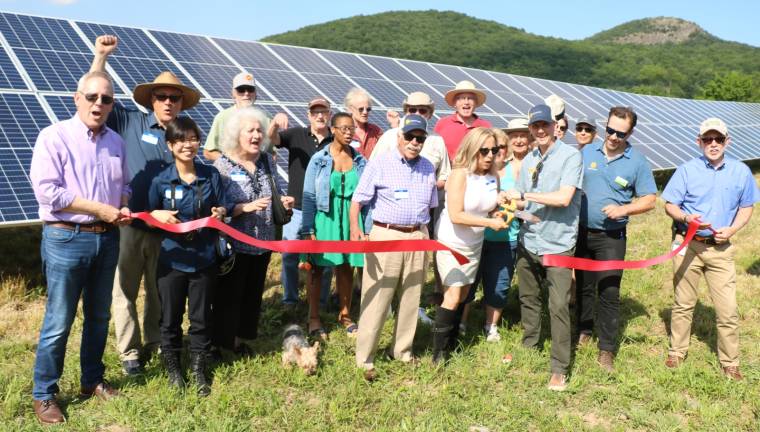 SunCommon and Orange County Citizens Foundation celebrate opening day of solar array On Wednesday, June 26, Town of Warwick Supervisor Michael Sweeton (far right) and members of the Warwick Valley Chamber of Commerce climbed to the top of a hill overlooking Sugar Loaf Mountain to join members of the Orange County Citizens Foundation and representatives of SunCommon to celebrate the occasion with a ribbon cutting.