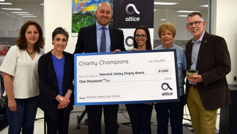 Altice USA selects Warwick Valley High School as a Charity Champion Provided photoPictured from left to right are: Shari Blauner, Warwick Valley High School; Louise Hutchison, Warwick Valley School District; John Dullaghan, Altice USA; Gina Buffardi, Warwick Valley High School; Shirley Puett, Warwick BackPack Snack attack director; and Warwick Town Supervisor Michael Sweeton.