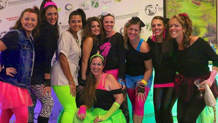 Education Foundation's first fund raisers of the year generate nearly $4,000 On Sept. 17, the Warwick Foundation for Excellence in Learning hosted its first - and nearly sold out - annual Decade Themed Party at the Warwick Valley Country Club. The theme of the fund raiser was the 1980s. Pictured from left to right are: Kristin Donneally, Laura Green, Sylvia Roome, Tara Walsh, Maura Ronan, Kerri Foley, Ellen Currid, Jennifer Mosier and Inga Mezzetti.