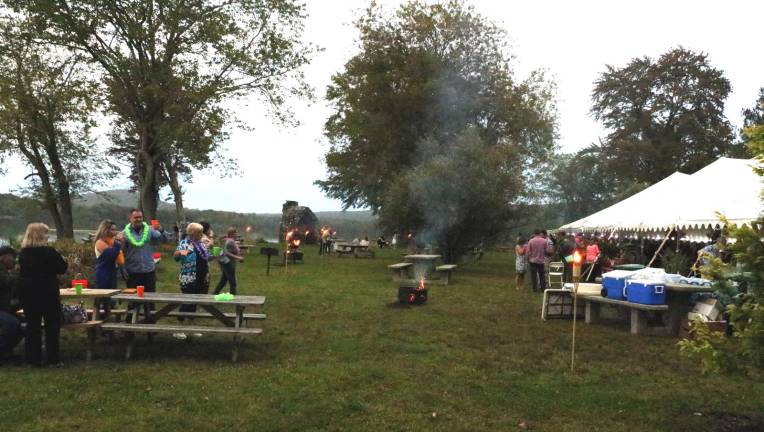 On Saturday evening, Sept. 14, approximately 200 guests gathered both outside and inside under a huge tent to enjoy a festive and well-organized event with a Hawaiian Lu’au theme.