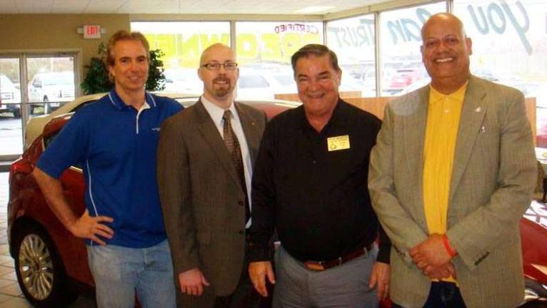 Warwick Rotarians to host spring golf outing on April 30 PHOTO BY SEAN RYAN Two major hole-in-one prizes will be available this year at the Warwick Rotary golf outing April 30. Leo Kaytes Ford again will sponsor a hole-in-one contest with a new Ford going to anyone acing the designated hole. In addition, Warwick Resource Group is offering $10,000 for a designated hole-in-one. Shown, left to right, are Rotarians Leo R. Kaytes; Ken Ford, golf chairman; Rotary District Assistant Governor Stan Martin; and Wayne Patterson, club president.