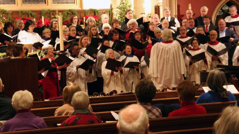 Twelfth Night Celebration for a Habitat House Christ Church Poughkeepsie's Music Director, Laura Russell, leads the EpiscoBuild Community Chorus during last year's benefit concert.