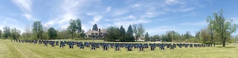 The town’s Department of Public Works and the school district installed the 300plus Warwick banners, creating a breath-taking display at the intersection of County Route 1 and Route 94, near Chateau Hathorn. It is illuminated each evening. Photo by Terry Reilly.