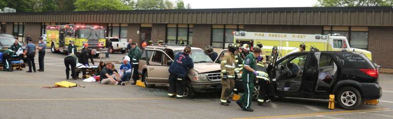 'This is not entertainment' Firefighters were soon in action using the “jaws of life” equipment to cut through jammed doors and free those who were trapped in the vehicles.