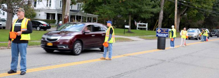 Warwick Knights of Columbus raises $1,500 for disaster relief Photo by Roger Gavan On Saturday, Oct. 20, members of the Warwick Council 4952 of the Knights of Columbus were collecting contributions from drivers traveling along Oakland Avenue in the Village of Warwick.