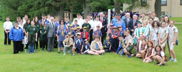 'May Peace Prevail on Earth' Photo by Roger Gavan On Monday, May 28, military veterans, first responders and educators were honored with the dedication of a "Peace Pole" in Veterans Memorial Park, that was sponsored by the Warwick Valley Rotary Club.