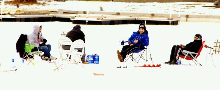 On frozen Greenwood Lake With the company of friends, it didn't matter if the fish weren't biting.