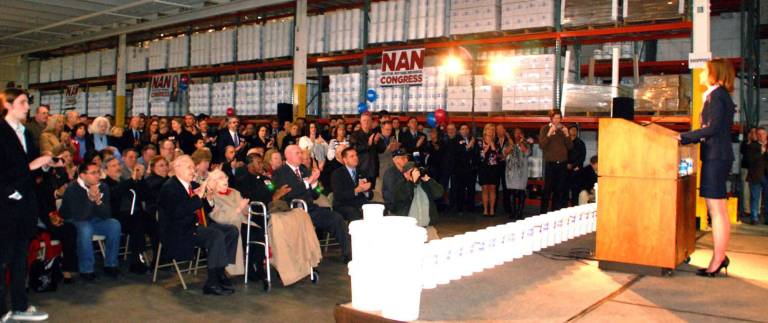 Back in the race Photo by Ed Bailey During her remarks Sunday announcing she will again run for Congress, Nan Hayworth spoke about veterans, and then introduced her parents who were sitting in the front row. Both parents are World War II veterans - her father George served in the U.S. Army while her mother Pat served in the Auxiliary Territorial Service (ATS), the women's branch of the British Army. The crowd gave the couple a standing ovation.