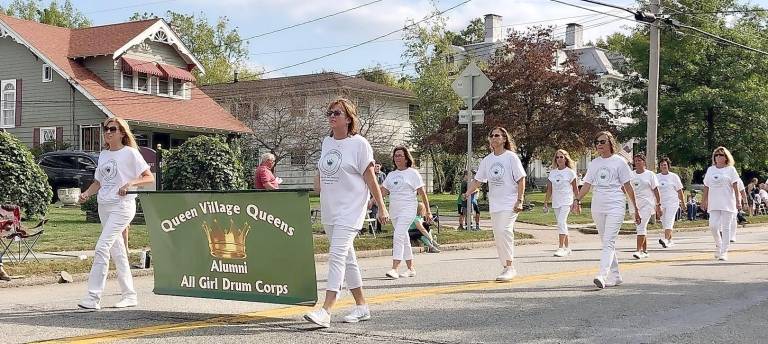 Among the marchers in the parade's long line of participants was the Queens Village Queens All Girl Drum Corps alumni.