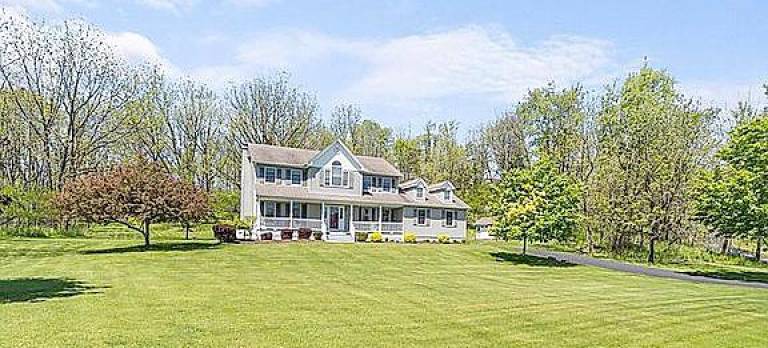 Five acres. Four bedrooms. Rocking chair front porch.