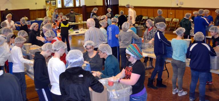 10,000 meals On March 15, 60 students and 20 adults - the parishioners of St. Josephís Church in the Village of Florida - packaged 10,000 meals to feed the hungry people of Burkina Faso in West Africa.