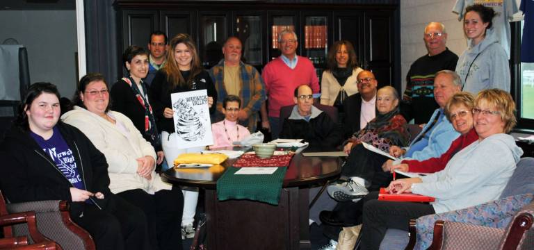 Warwick Valley Empty Bowls 2012 Photos by Louise Hutchison The Warwick Valley Empty Bowls 2012 Committee meets with representatives of Town of Warwick food pantries and community meal providers. WVHS art student Eliza Bender displays her design, used on this year's posters and T-shirts.