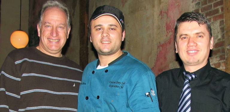 Grappa Ristorante sponsors Backpack Snack Attack fund raiser Photo by Roger Gavan The Backpack Snack Attack Program will hold a pre-Valentineís Day dinner and fund raiser at Grappa Ristorante on Monday, Feb, 11. Pictured, from left to right, are: Backpack Snack Attack volunteer Len Singer with Nick Ahmetaj and Tony Sylaj, co-owners of Grappa Ristorante.