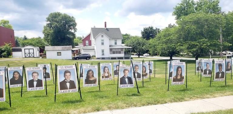 Florida. Photos of members of the S.S. Seward Institute graduation class on display