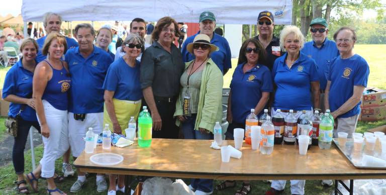 Great food, music and company The Town of Warwick and the Warwick Valley Rotary, some of whose members are pictured here, hosted the annual senior barbecue at the Town’s Union Corners Park.
