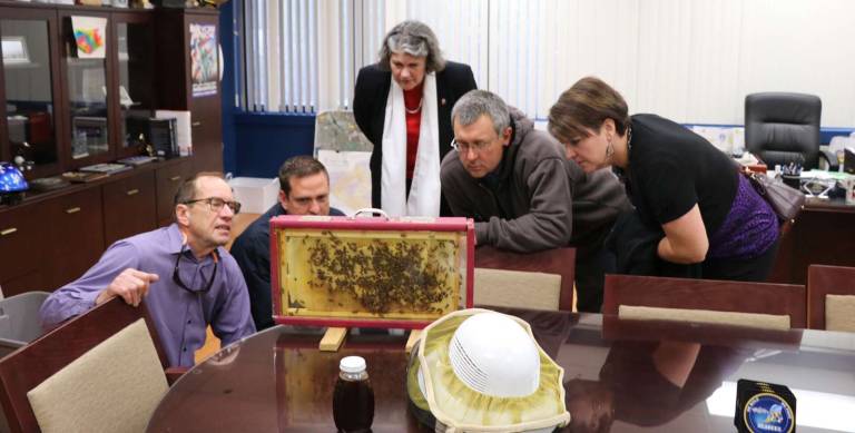 County Executive Neuhaus urges residents to be kind to honey bees Photo provided by the Office of the County Executive Pictured from left to right are: Warwick beekeeper Roger Moss; Orange County Executive Steven M. Neuhaus, Lucy Joyce, executive director of the Cornell Cooperative Extension, Walden beekeeper Tim Maendel, and Jennifer Robles, Orange County 911's director of operations.