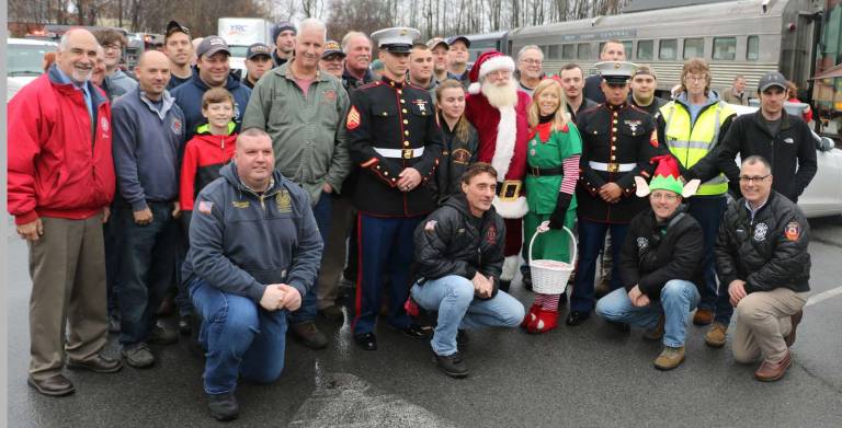 Operation Toy Train arrives in Warwick to collect toys for needy families These volunteers make it happen.