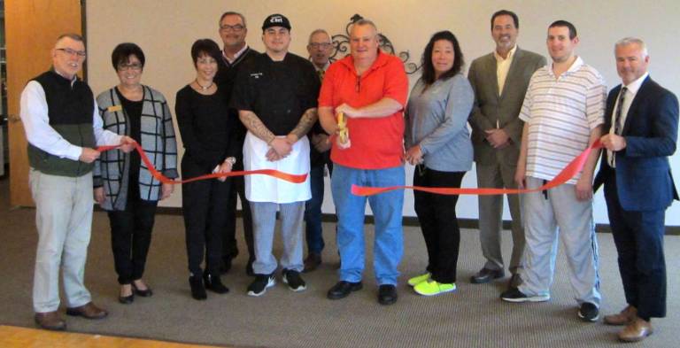 Hickory Hill food and beverage department management change Photo by Bea Arner On Wednesday, Nov. 1, Hickory Hill Catering Food and Beverage Director Robert Freeman and Executive Chef Phillip Dunn (center) were on hand to cut the ribbon and greet notable friends, family, employees and members of the community at Hickory Hill Golf Course.