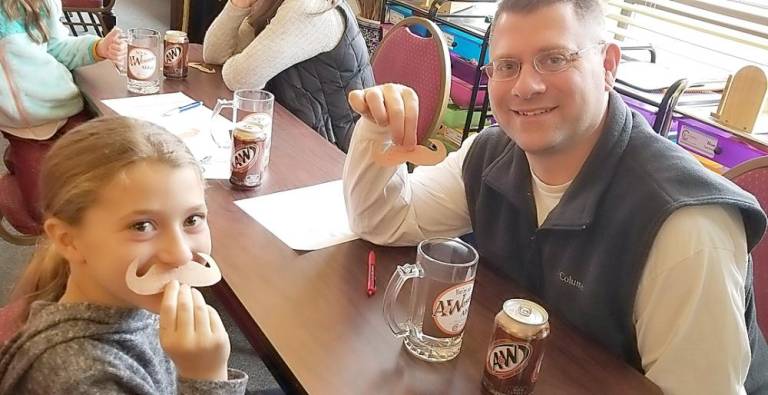 Gabi Patsiner of Monroe and her dad Dan at A&amp;Wesome Aba Father’s Day event at Chabad Hebrew School.