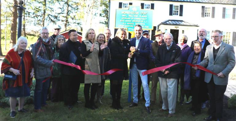 Warwick's new White House celebrates unveiling of historic marker Photos by Roger Gavan On Oct. 18, Town of Warwick Supervisor Michael Sweeton (far right), Mayor Michael Newhard (far left), members of the Warwick Historical Society, Friends of Hathorn House and members of the Warwick Valley Chamber of Commerce joined new White House owners Arek Kwapinski and Sylvia Kubasiak (center), along with other guests. for a ribbon-cutting and unveiling of the new historical marker.