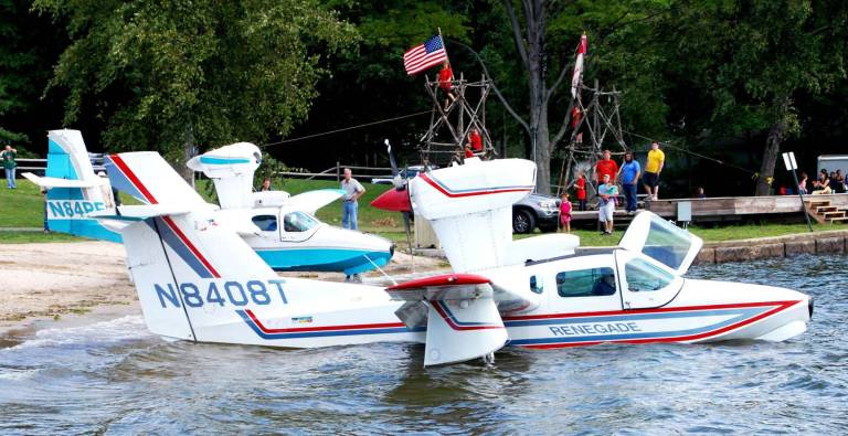 Ten seaplanes splash down onto Greenwood Lake Photo by Ed Bailey Seaplanes parked in the shallow water and on the beach at the Thomas P. Morahan Waterfront Park in Greenwood Lake for last weekend's sixth annual fly-in.